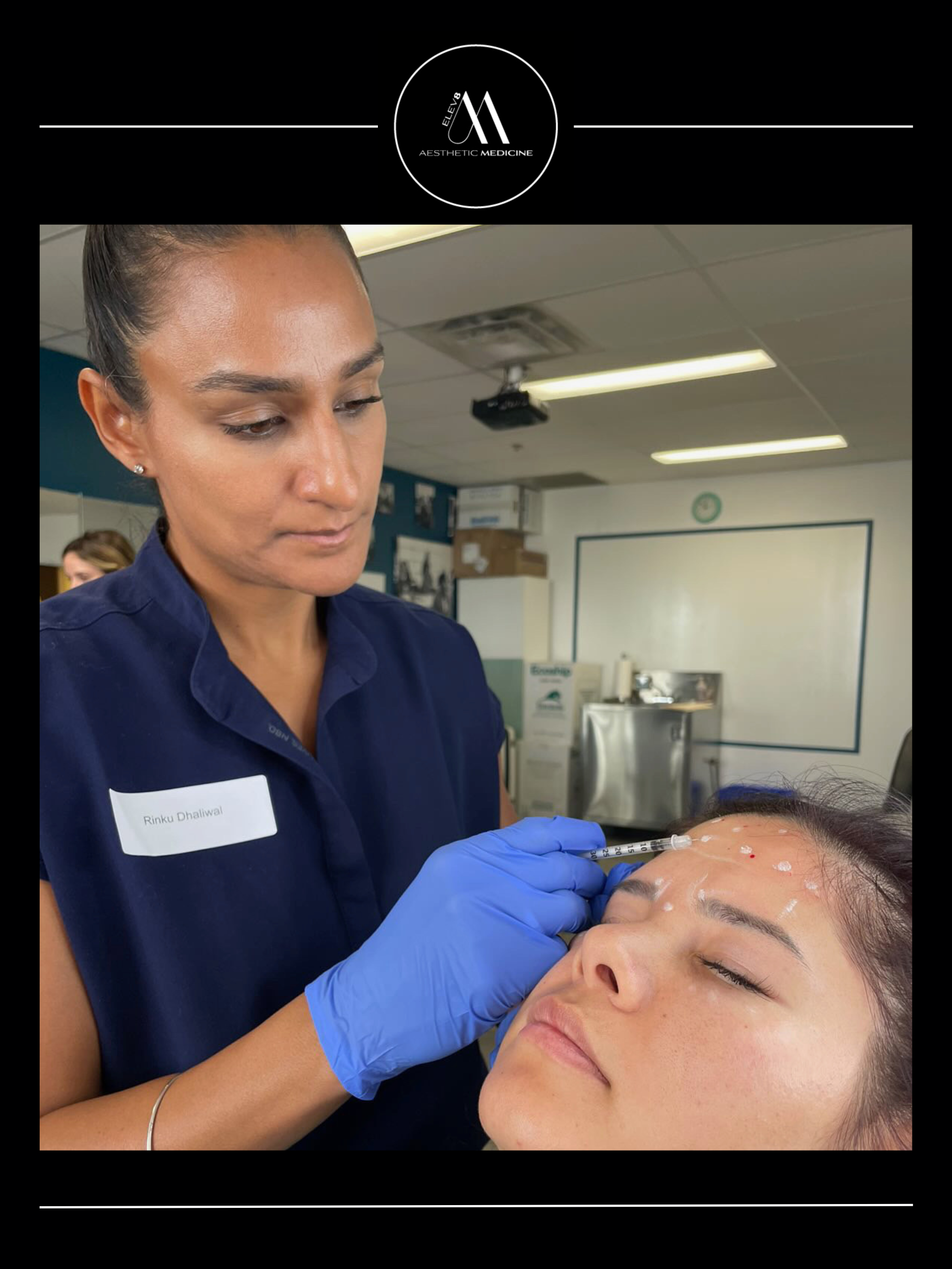 This image shows our lead injector performing a treatment on a model while teaching new nurses.