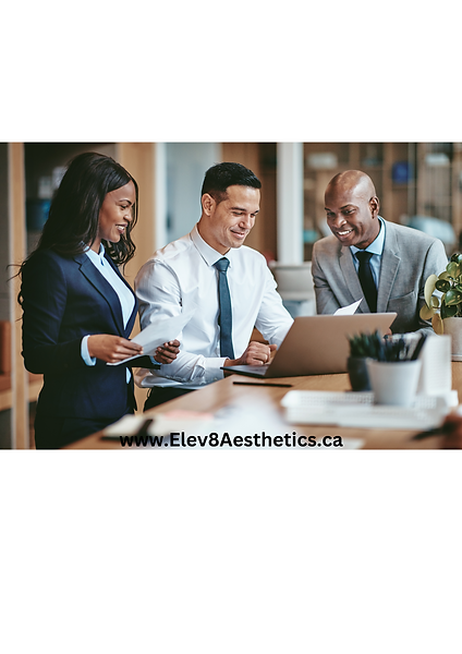 Group of professionals collaborating at a computer, prioritizing wellness and productivity with Elev8 Aesthetic Medicine.