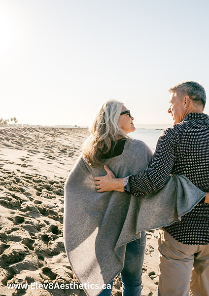 A healthy, vibrant retired couple enjoying a stress-free lifestyle with proactive wellness care from Elev8 Aesthetic Medicine.
